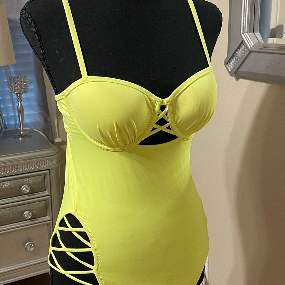 6 sexy swimsuits - worn only briefly for photo shoots. All 6 for$ 50.00